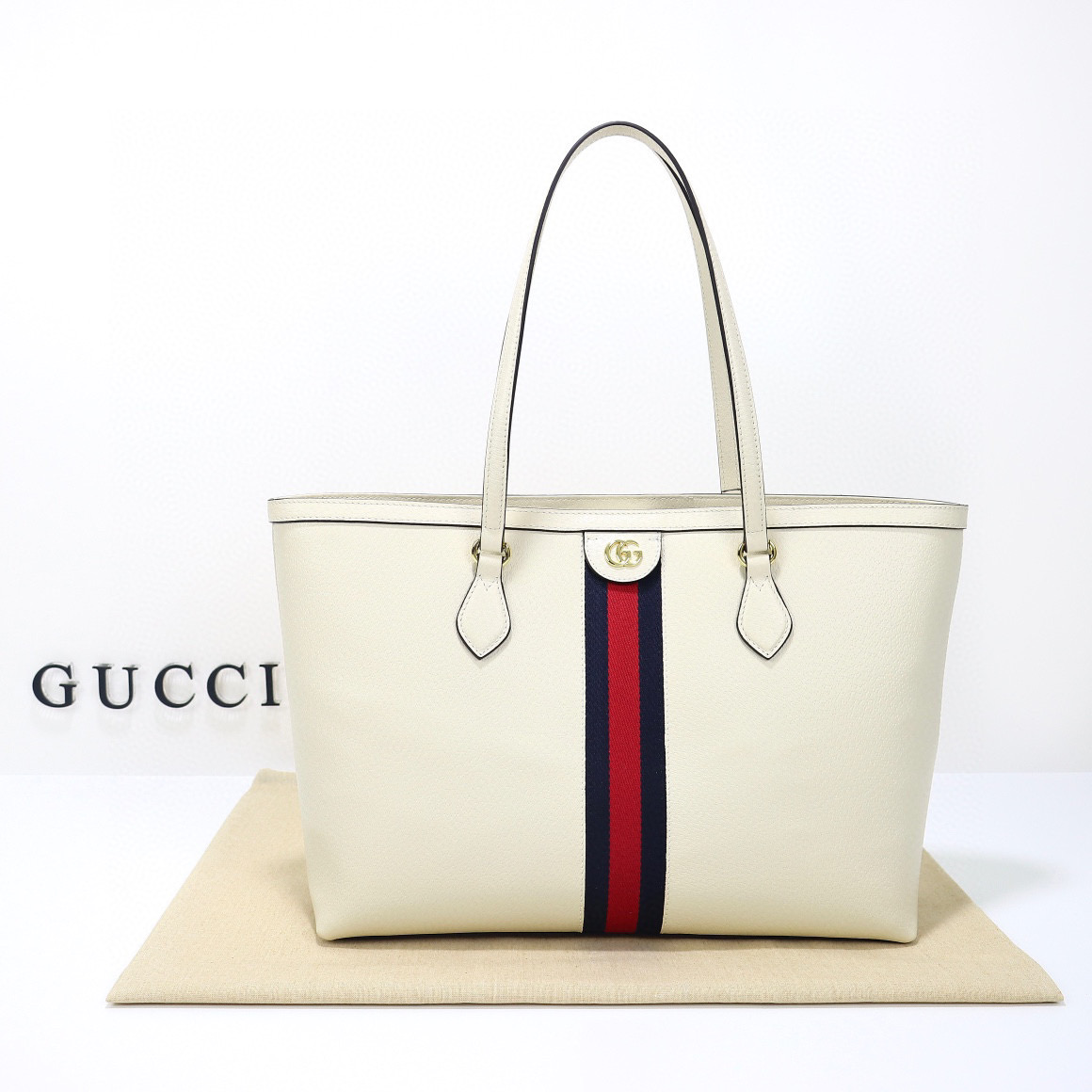 Ophidia medium leather tote in white