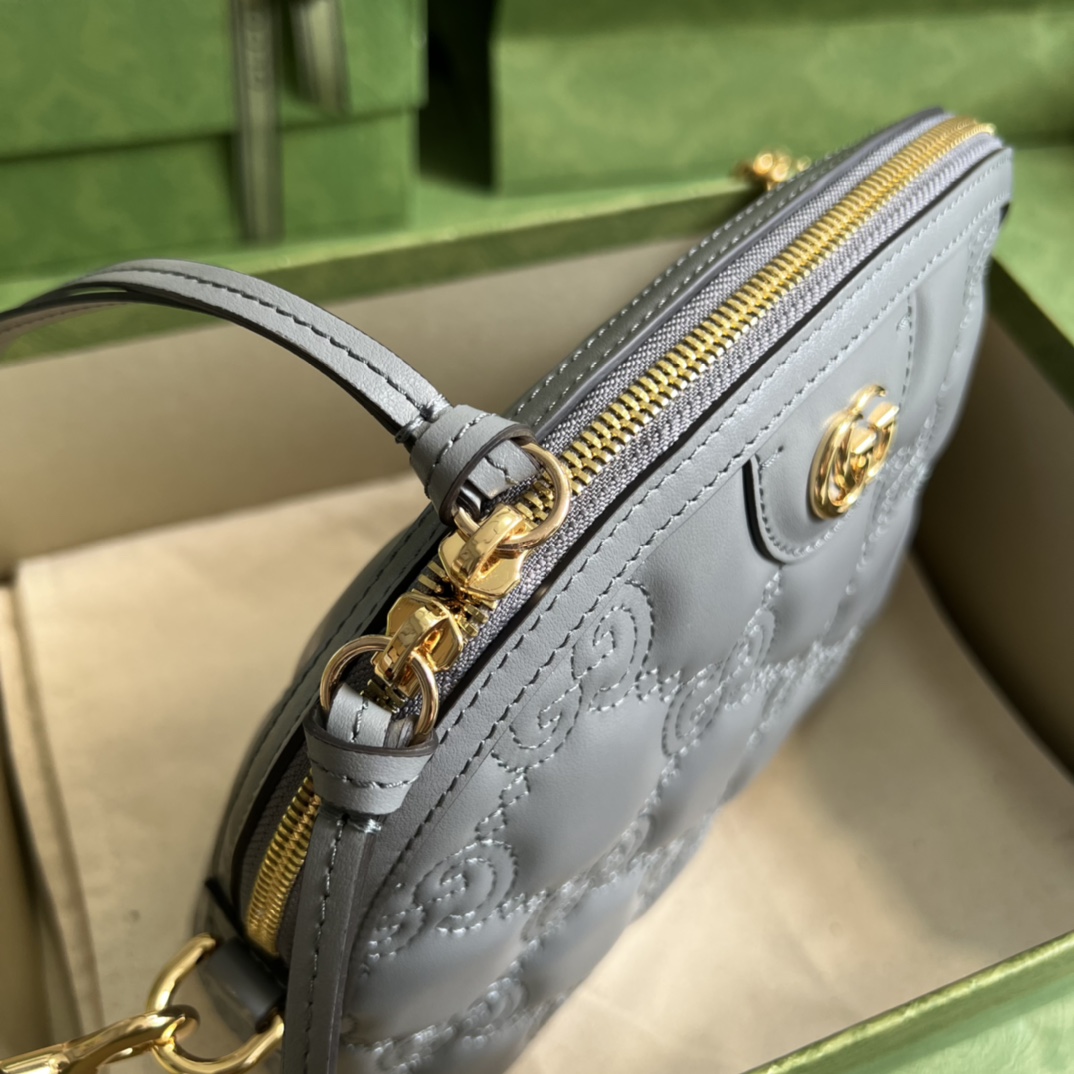 GG Matelassé leather small bag
