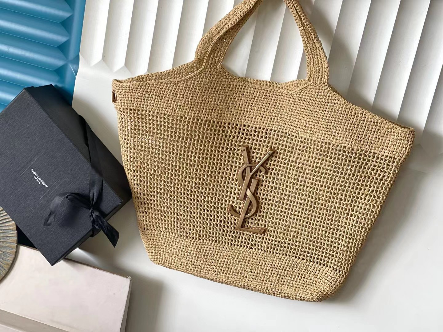 ICARE IN RAFFIA