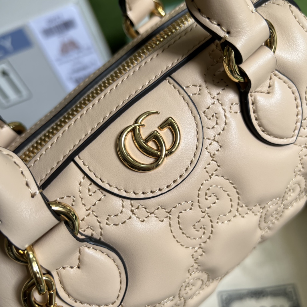 GG Matelassé leather mini bag