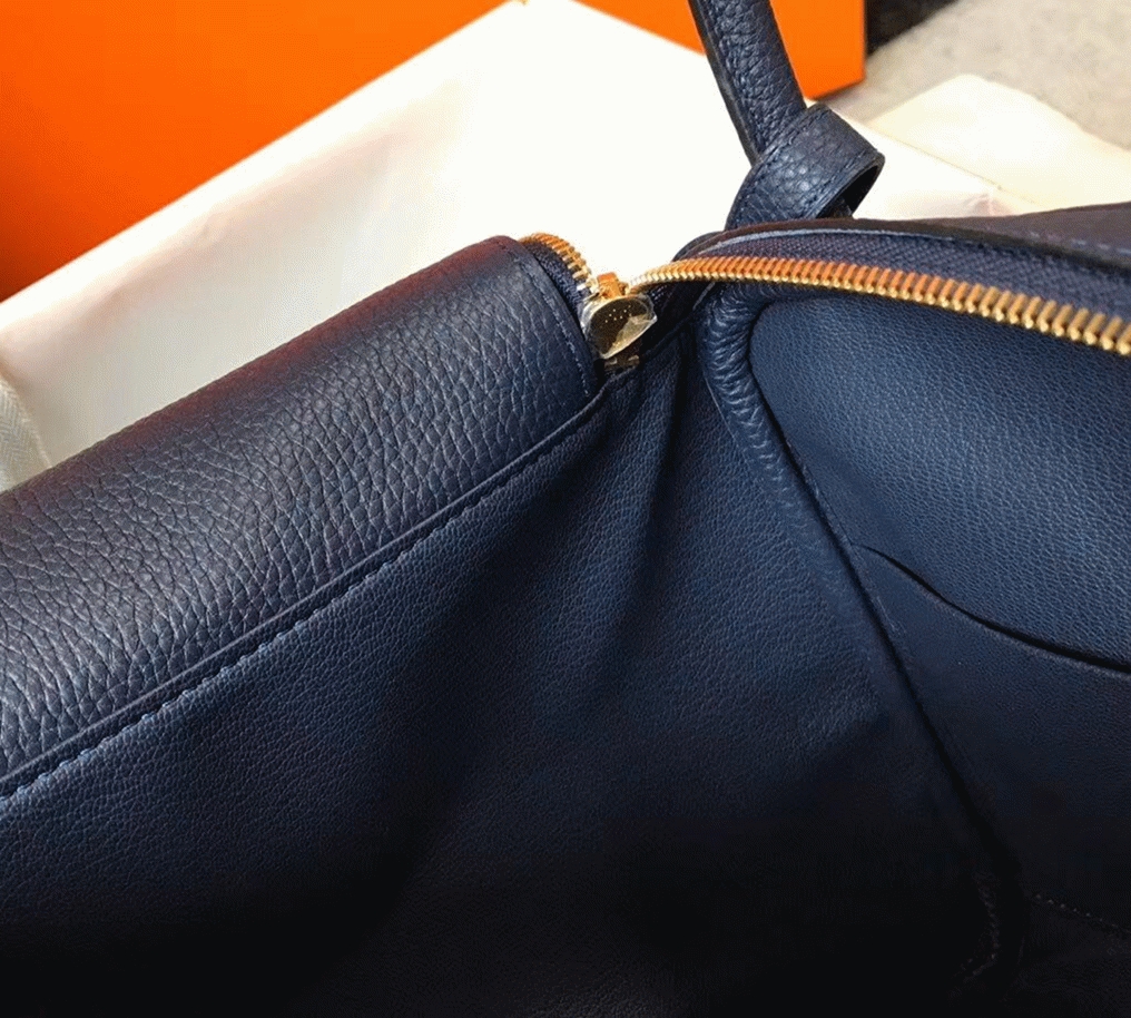 Fake designer H**me5 Lindy 26cm handbag in navy blue
