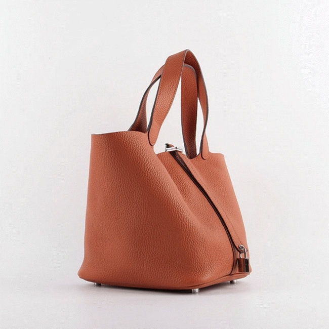 Orange knockoff H**me5 Picotin Lock handbag