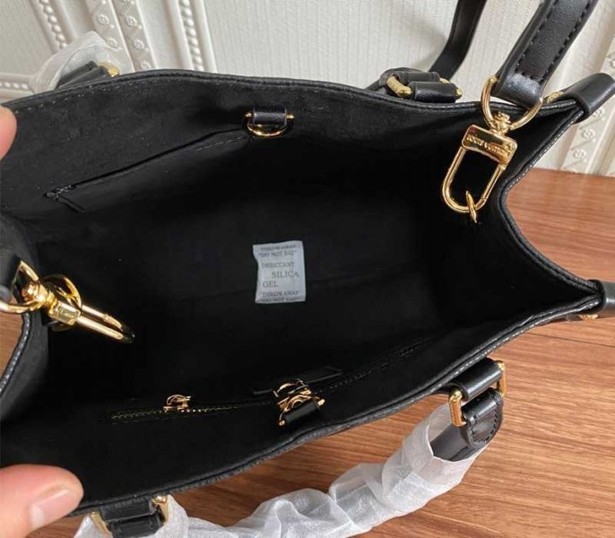 L0vis Vvtt0n Monogram Empreinte Leather Onthego PM Bag In Black