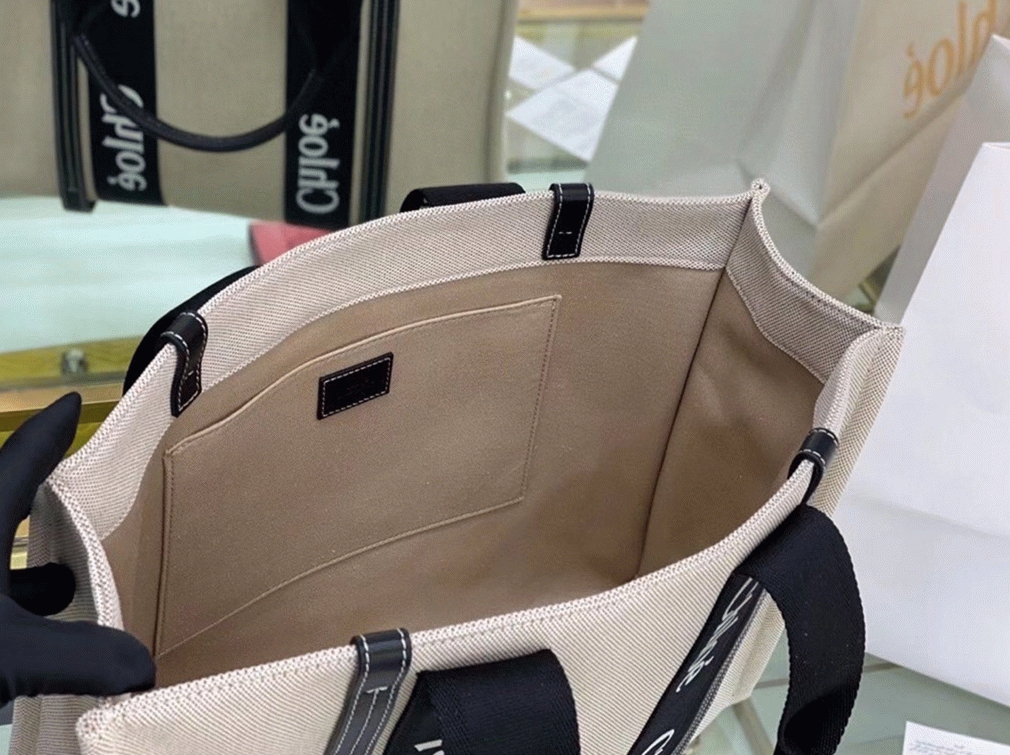top quality knockoff Ch10e medium woody tote bag in canvas with black leather strips