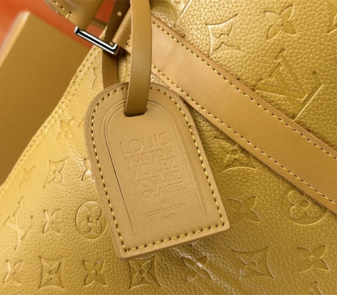 L0vis Vvtt0n Taurillon Leather Keepall Bandouliere 50 In Safran Yellow