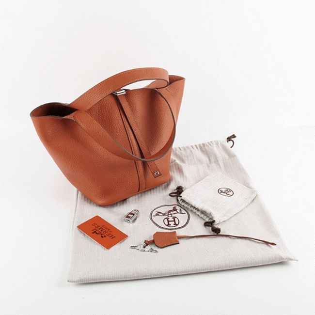 Orange knockoff H**me5 Picotin Lock handbag