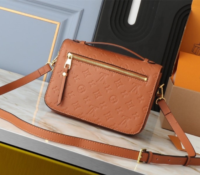 L0vis Vvtt0n Monogram Empreinte Metis Handbag In Cognac Brown