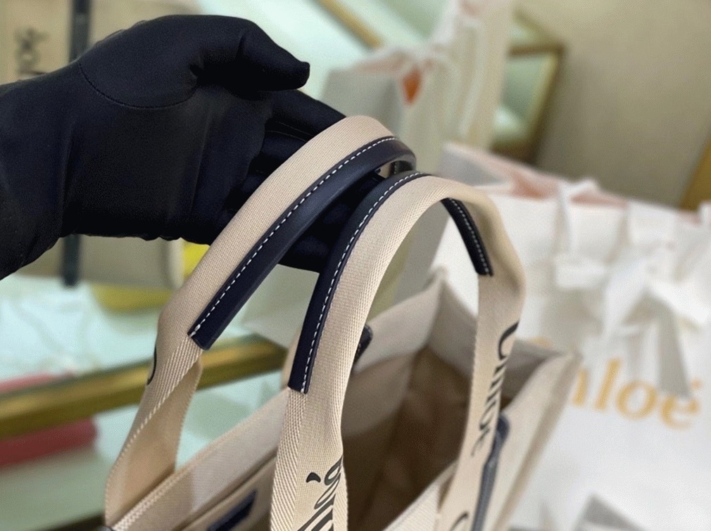 top quality replica Ch10e large woody tote bag in canvas with blue leather strips