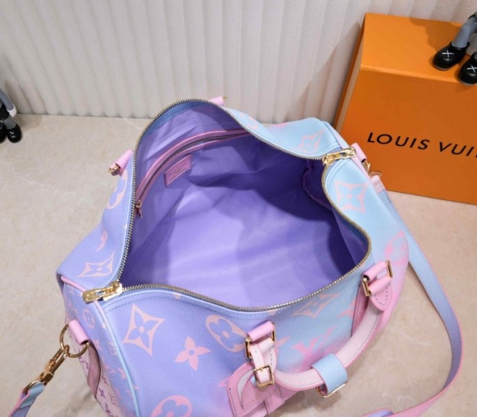 l0vis vvtt0n spring 2022 keepall 45 lU*gage in sunrise pastel