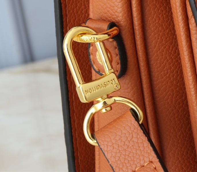L0vis Vvtt0n Monogram Empreinte Metis Handbag In Cognac Brown