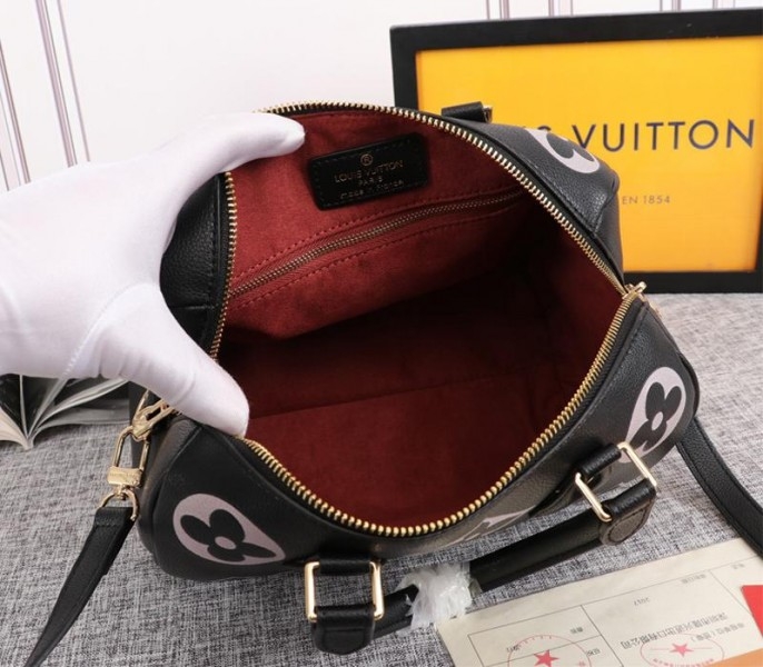 L0vis Vvtt0n Bicolor Monogram Empreinte Leather Speedy Bandouliere 25 Handbag In Black And Lilac