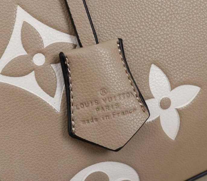 L0vis Vvtt0n Monogram Empreinte Montaigne MM In Tourterelle Gray