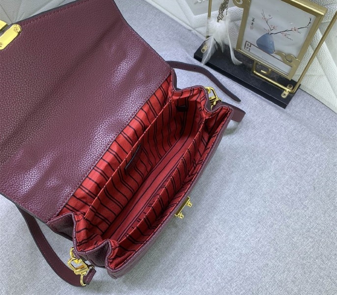 LV Monogram Empreinte Leather Metis In Wine