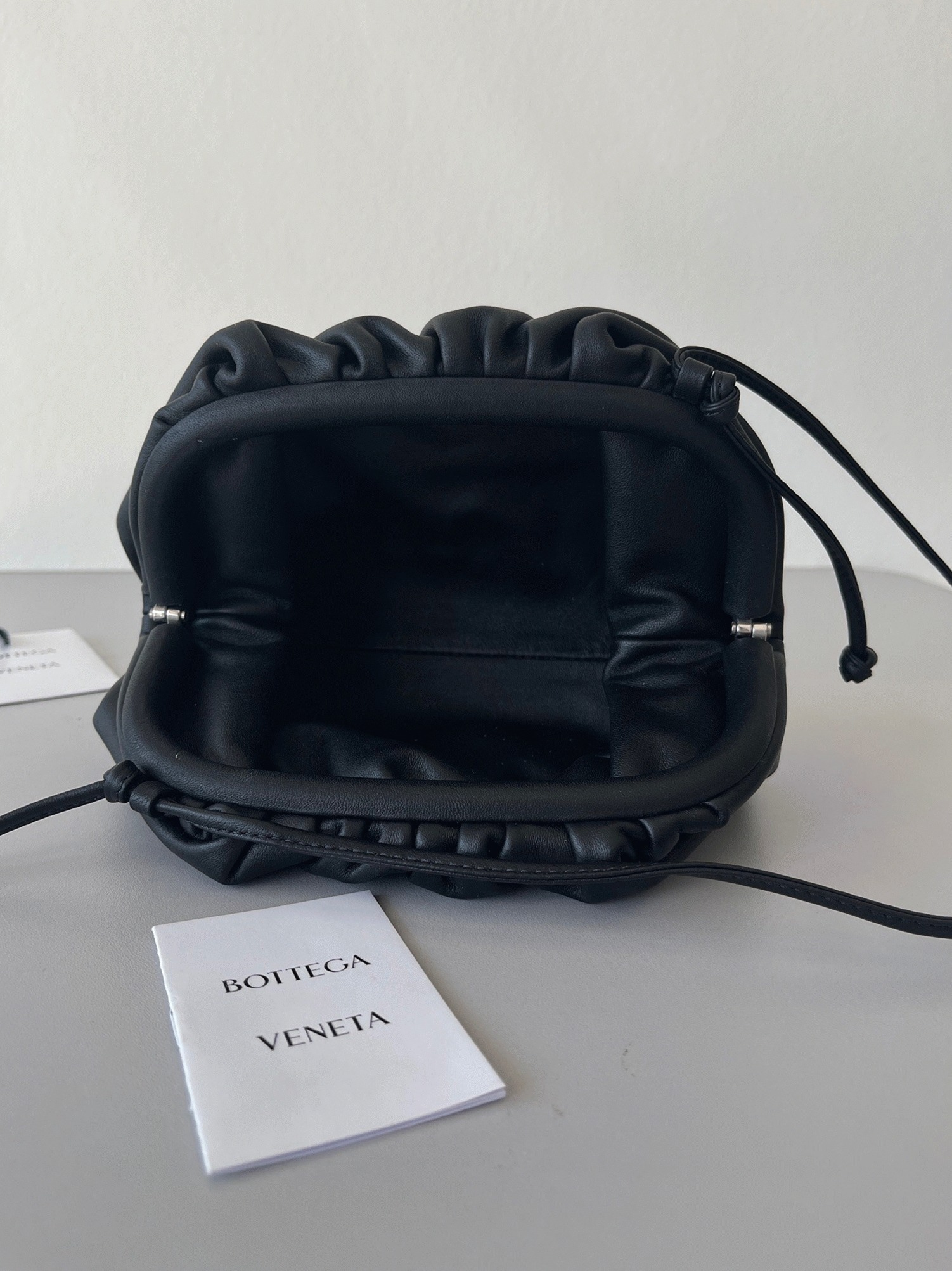 Knockoff B0tt*ga Ven*ta Mini Pouch with Strap Black