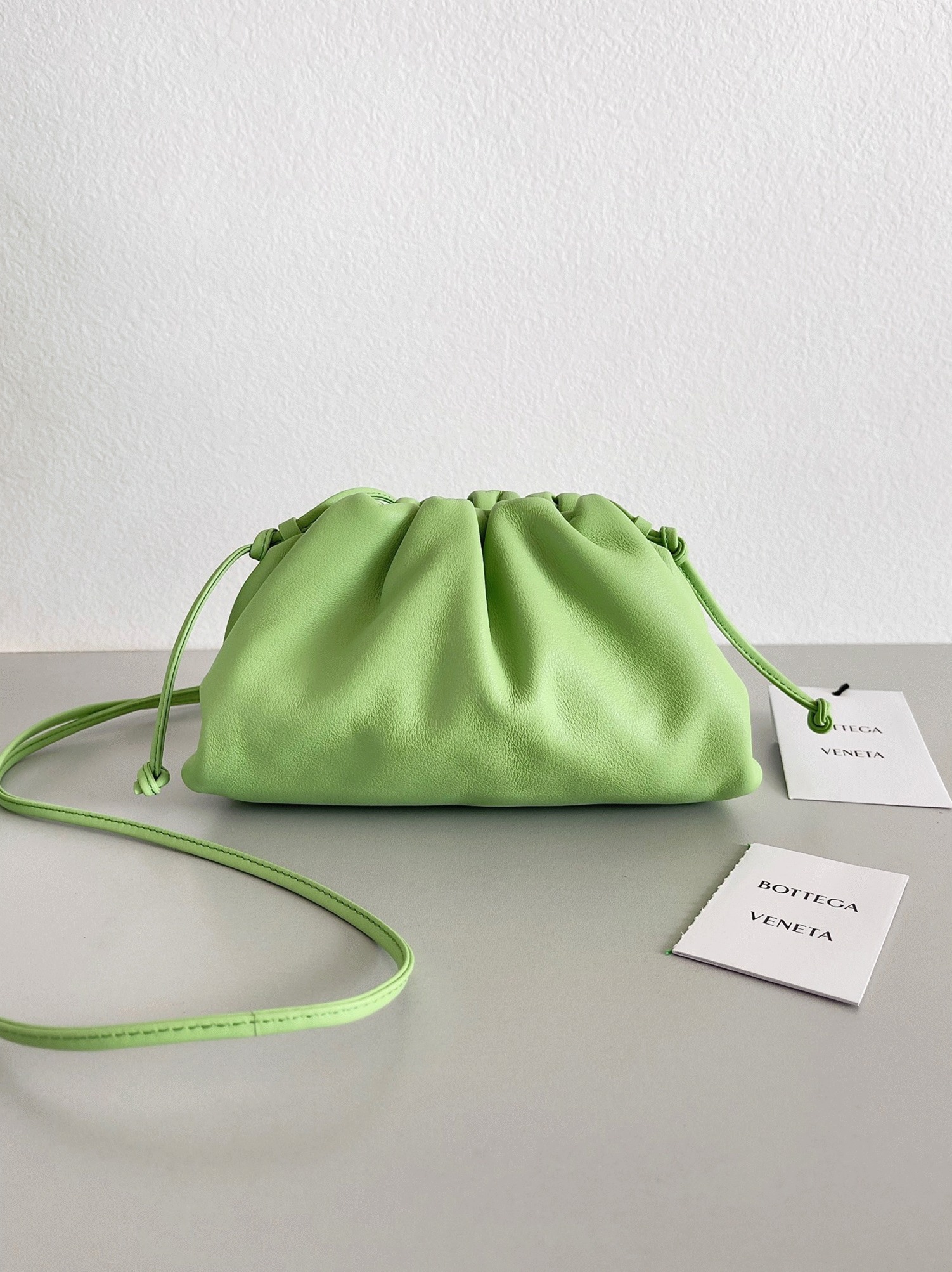 Fake B0tt*ga Ven*ta Mini Pouch with Strap Pistachio