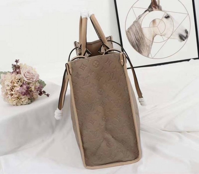 L0vis Vvtt0n Monogram Empreinte Giant Onthego GM Tote In Beige