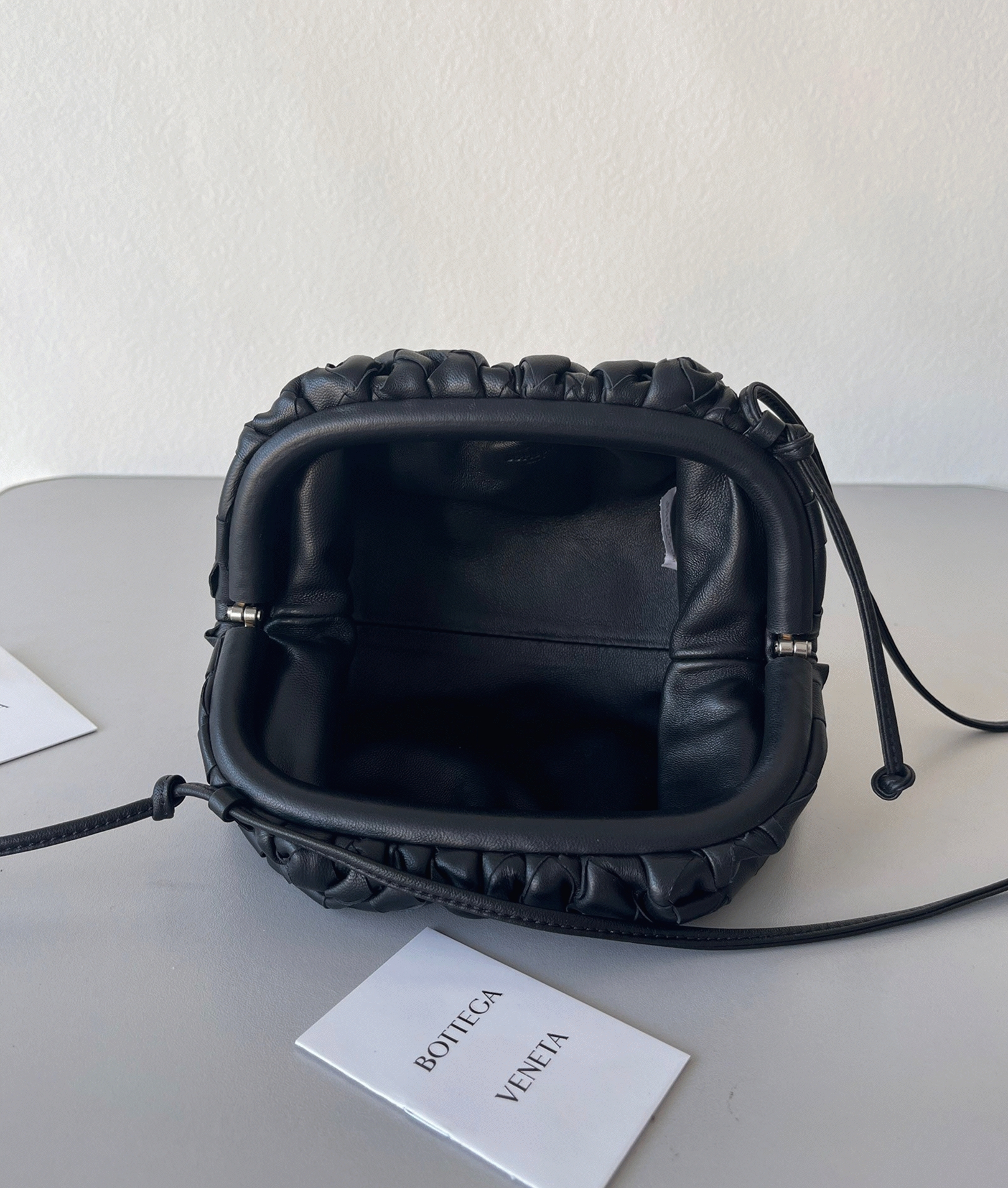 Knockoff B0tt*ga Ven*ta Mini Pouch with Strap Black