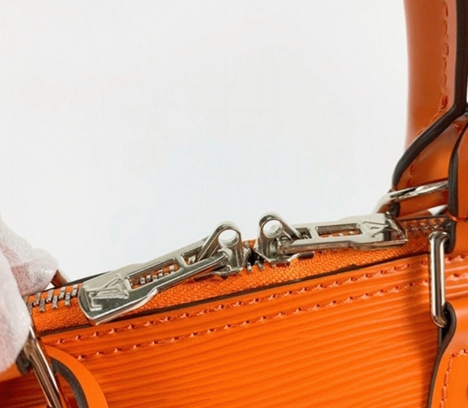 L0vis Vvtt0n Epi Leather Alma BB Handbag In Orange With Jacquard Strap