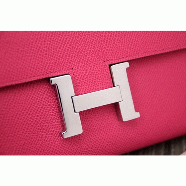 Peach knockoff H**me5 Constance wallet