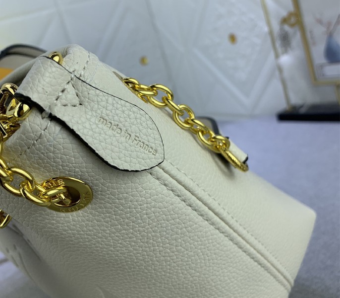 L0vis Vvtt0n Monogram Empreinte Leather Bundle Bag In Cream