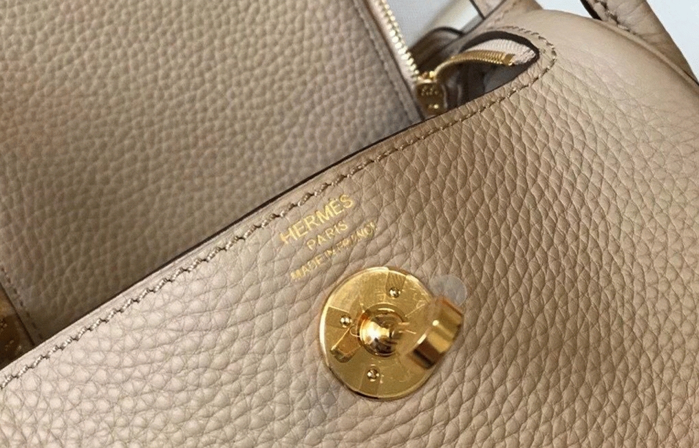 Top replica H**me5 Lindy Mini handbag in trench color