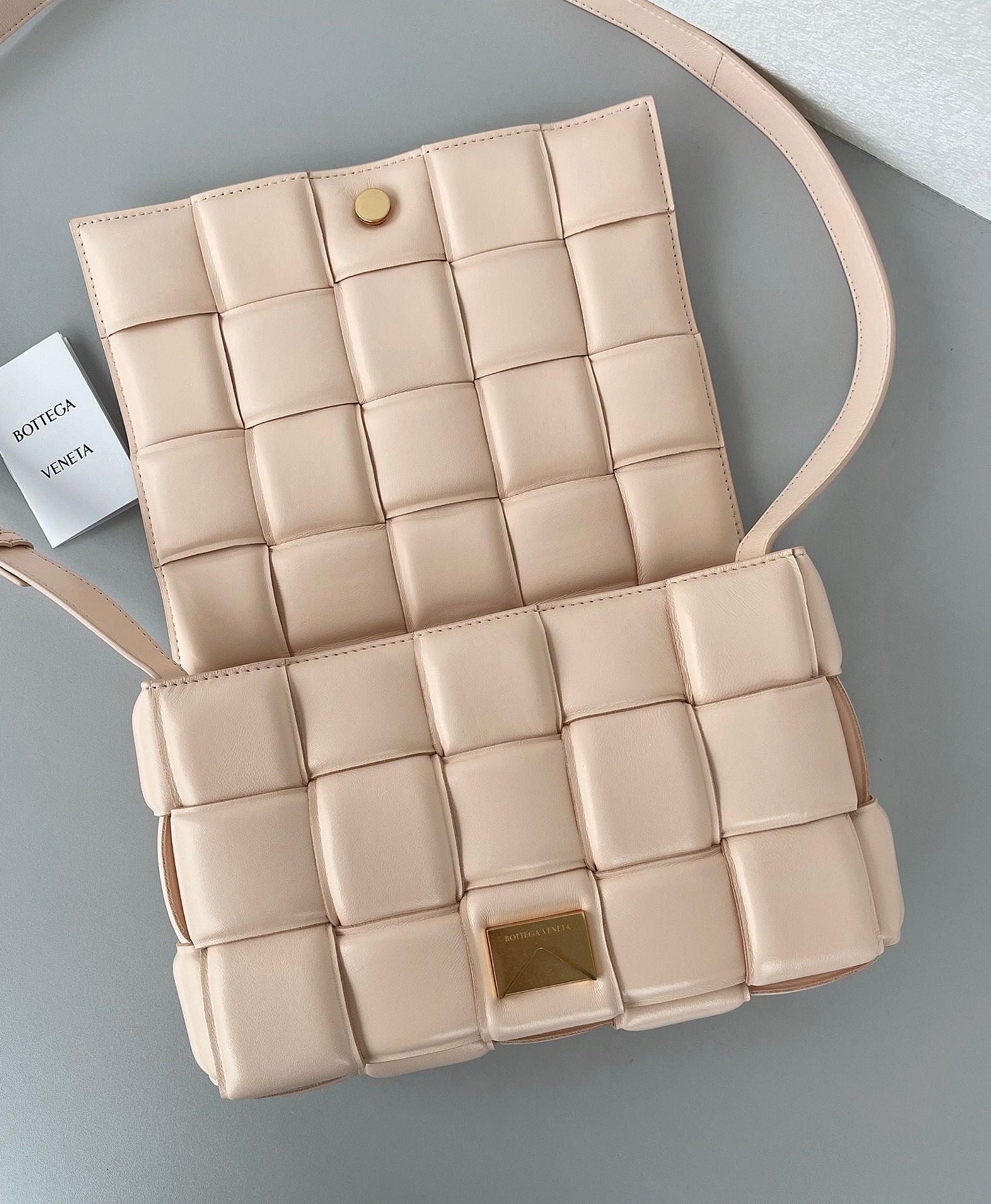 Top Quality Fake B0tt*ga Ven*ta Padded Cassette Bag In Melon
