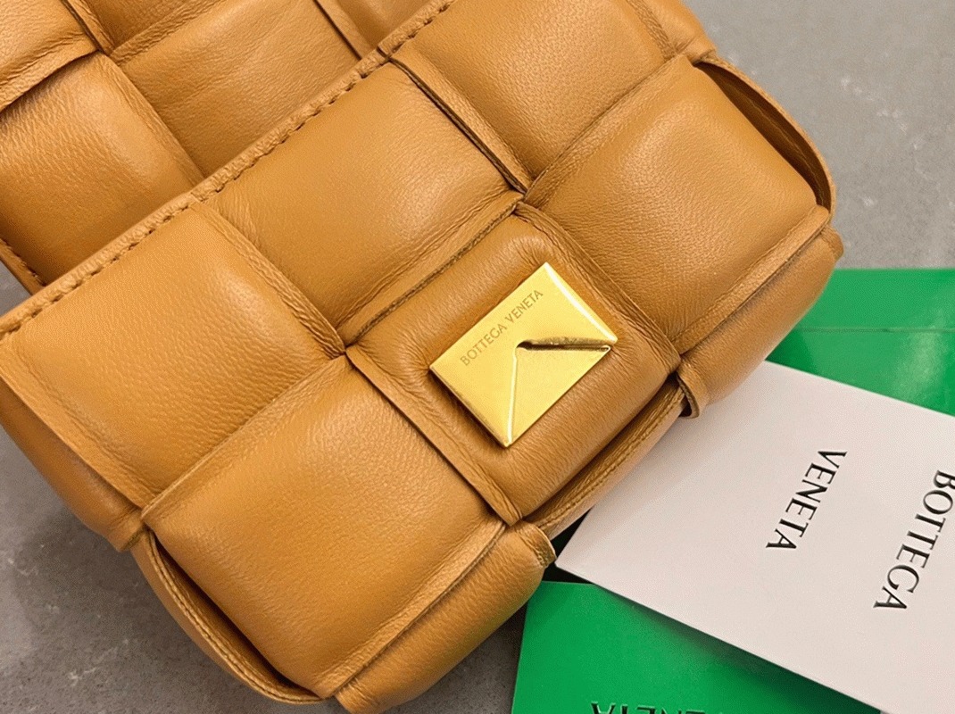 Top Quality Fake B0tt*ga Ven*ta Candy Padded Cassette Bag In Camel