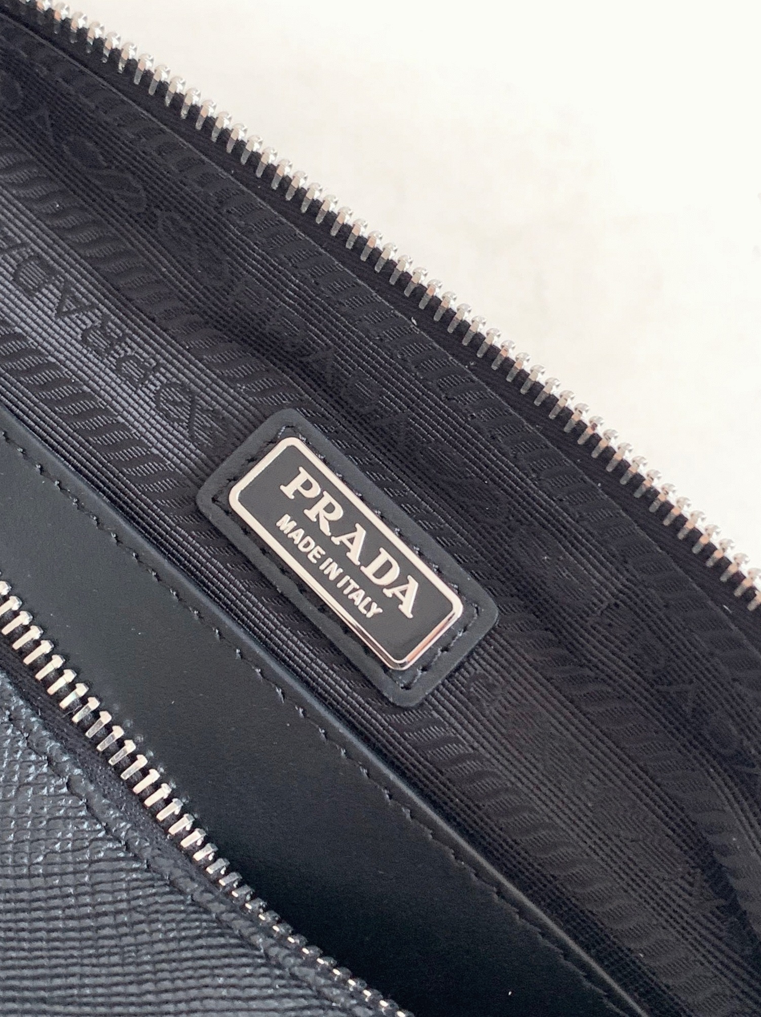 Pra*a Triangle Shoulder Bag Fake in Black