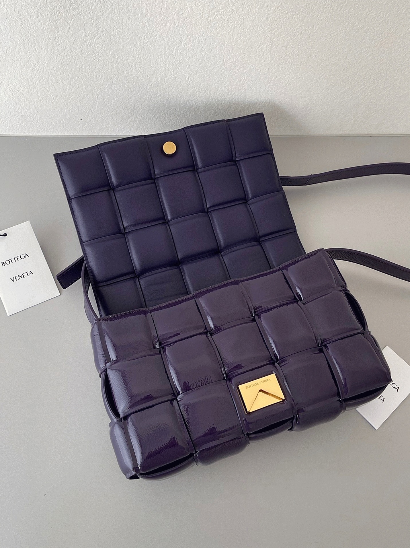 Top Quality Fake B0tt*ga Ven*ta Padded Cassette Bag In Purple