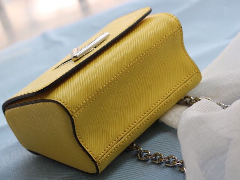 L0vis Vvtt0n Epi Leather Twist Mini Bag In Yellow