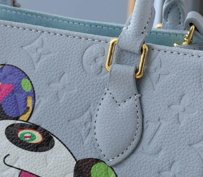 LV X TM Monogram Empreinte OnTheGo PM With Bijou Edition In Washed Blue