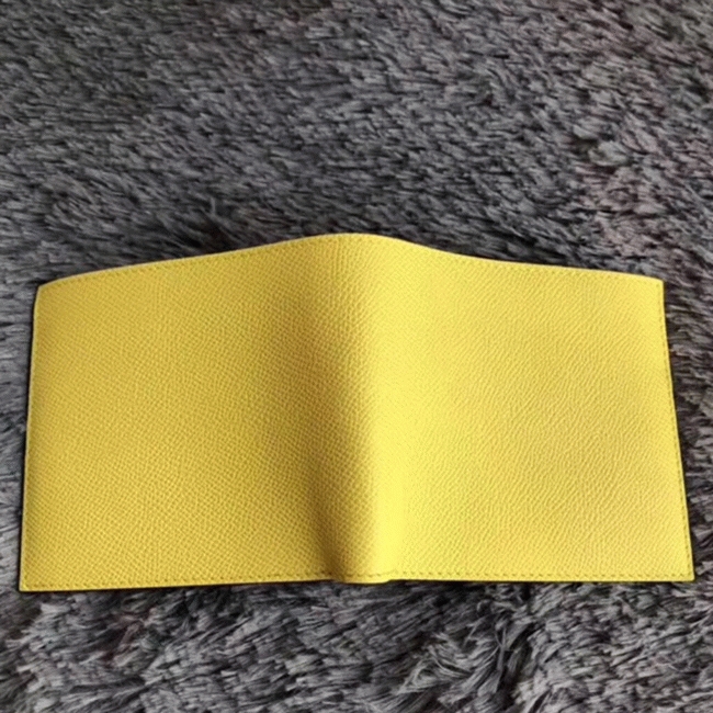 Yellow knockoff H**me5 Copernic compact wallet