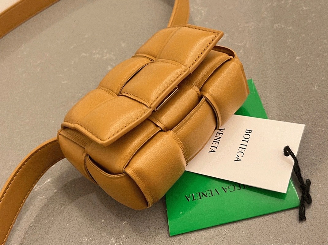 Top Quality Fake B0tt*ga Ven*ta Candy Padded Cassette Bag In Camel