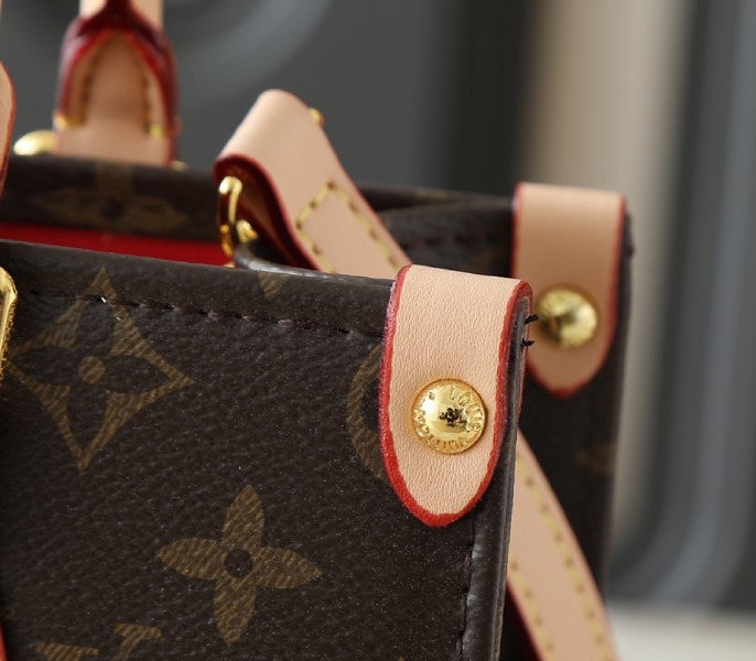 X TM Monogram Canvas OnTheGo PM With Bijou Edition