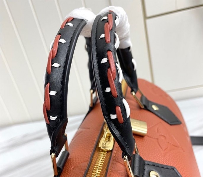 L0vis Vvtt0n Monogram Empreinte Wild At Heart Speedy 25 Bandouliere Handbag In Caramel Brown