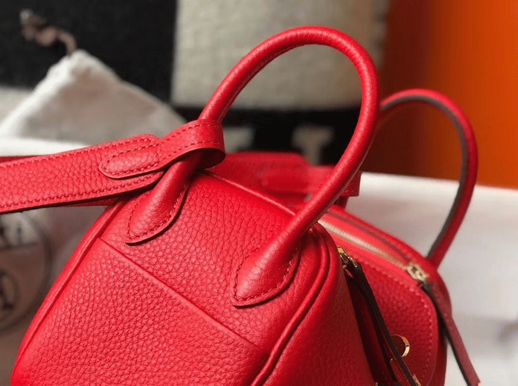 Fake designer H**me5 Lindy Mini handbag in red