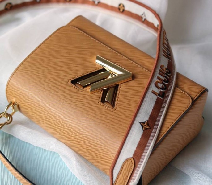 L0vis Vvtt0n Epi Leather Twist MM Bag With Jacquard Strap In Honey Gold