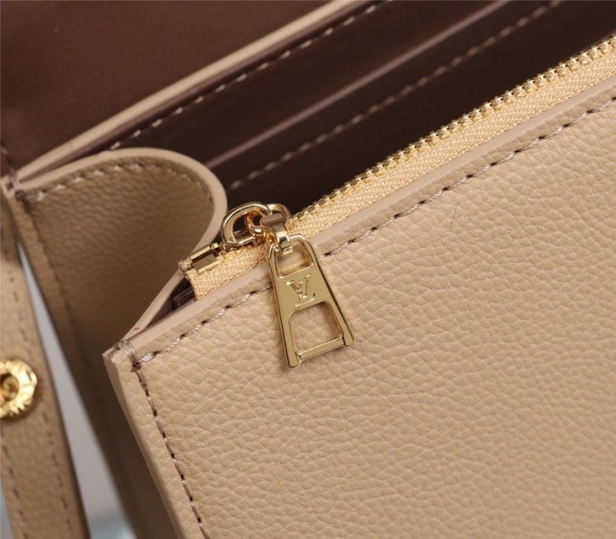 L0vis Vvtt0n Twist One Handle MM Handbag In Beige